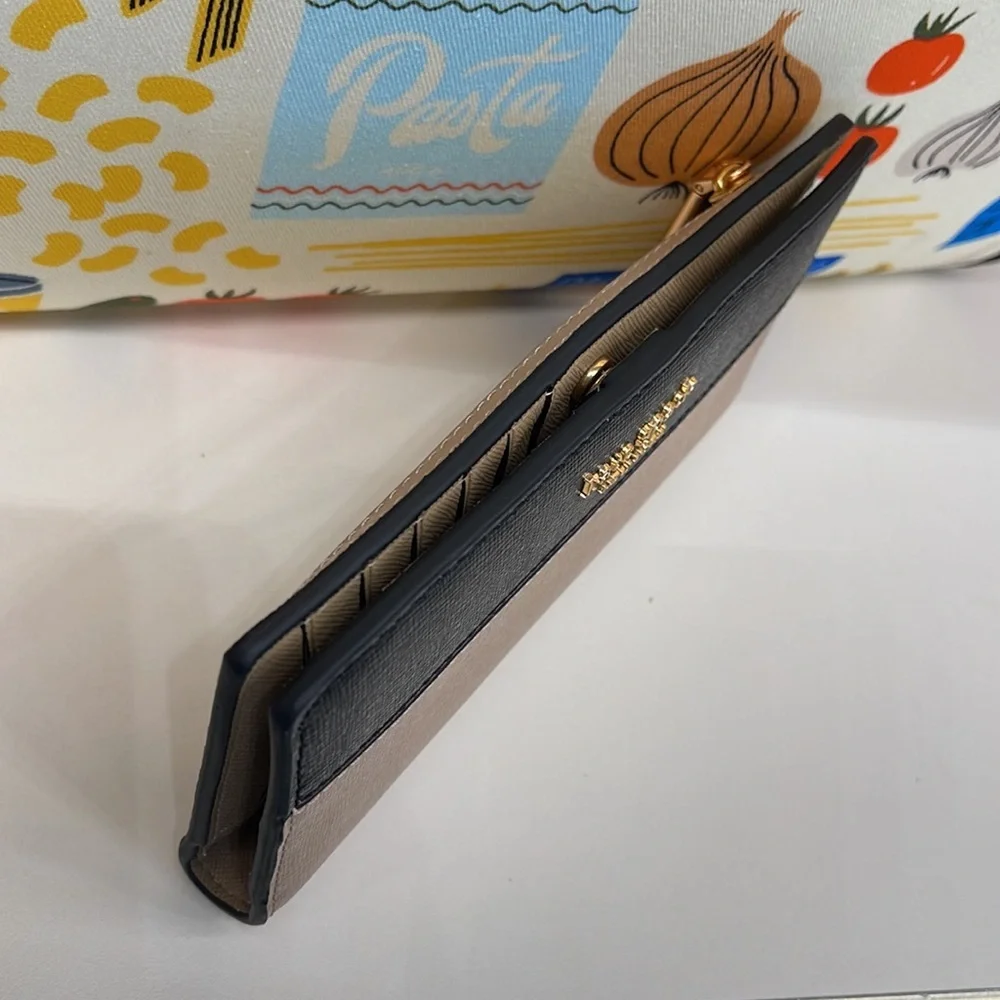 Kate Spade Morgan Colorblocked Slim Bifold Wallet Cafe Mocha
NWT - Picture 5 of 16